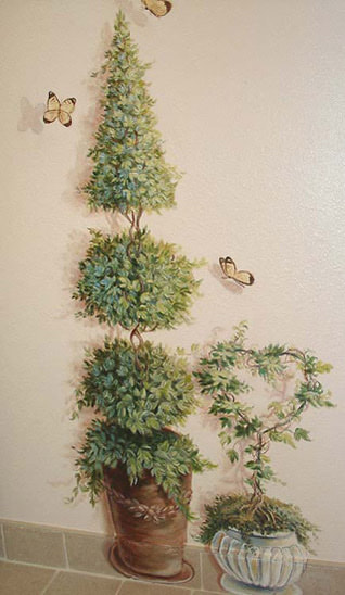 Trompe L'Oeil topiary painted on wall by artist Marsha Bowers